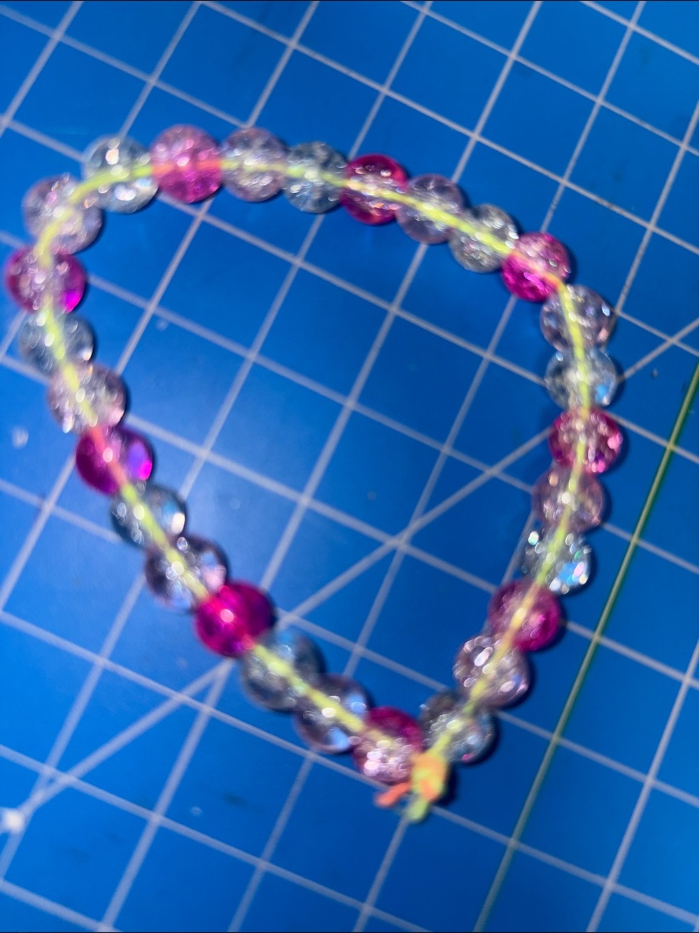 Pink light, pink and white bracelet